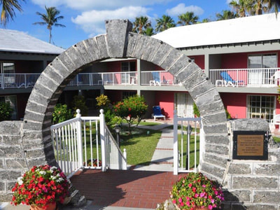 Stone archway to hotel courtyard